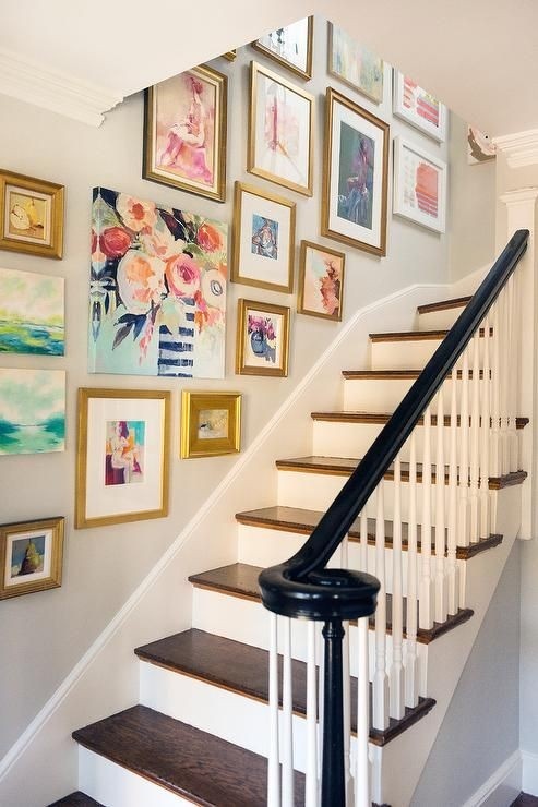 eclectic-salon-style-art-gallery-doesnt-overwhelm-this-graceful-staircase2-1-164650225