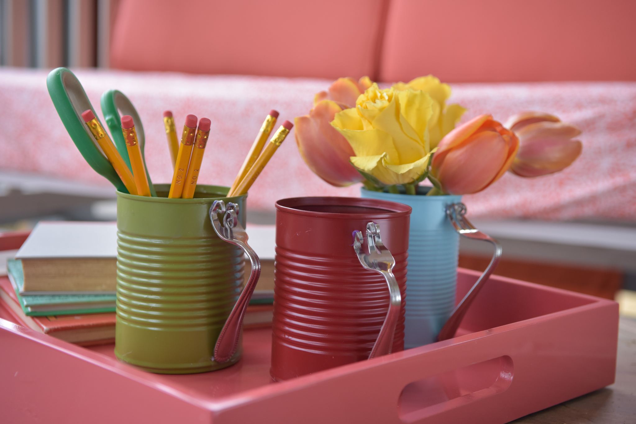 Create a place to keep everything in its place in your work space by upcycling cans into desktop organizers.